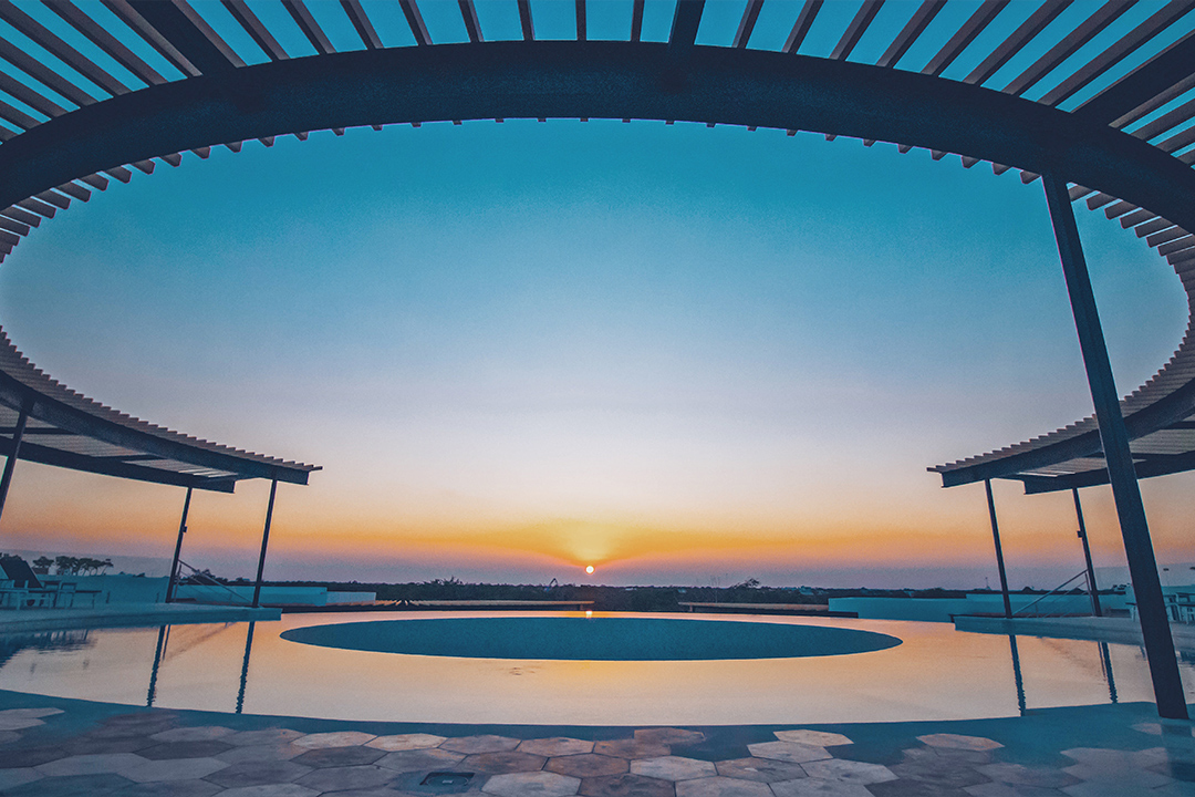 the panoramic tulum 360 infinity pool sunset