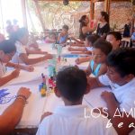 Kids celebrating at Los Amigos Beach