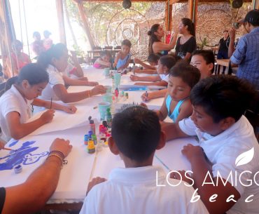 Kids celebrating at Los Amigos Beach